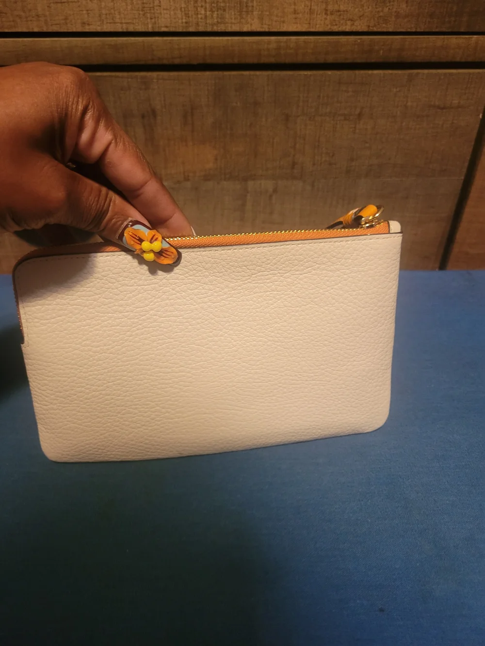COACH Cream Leather Wristlet with Orange Trim